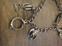 Silver charm bracelet w/turquoise $20