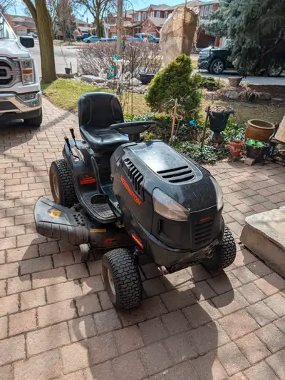 Black Remington ride on tractor with 100 hours usage. In good condition and has been maintained, pri...