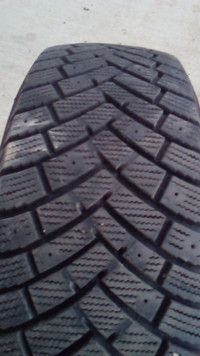 Single winter 215/65/16 tire like new!
