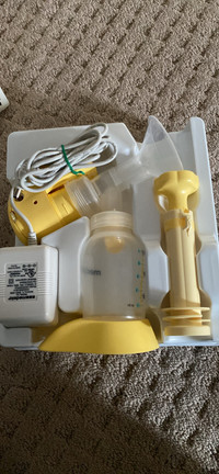 New Medela mini electric breast milk pump 