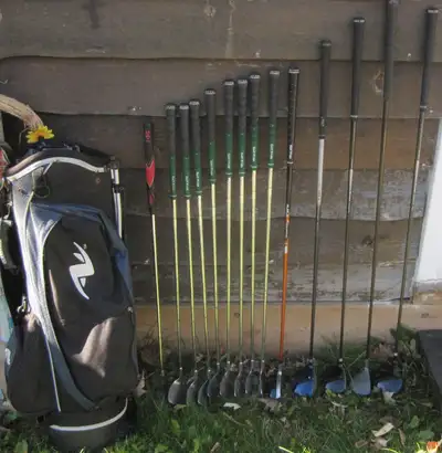 $200 Men's full set RH 14 clubs matching Daiwa irons, balls, bag, View more