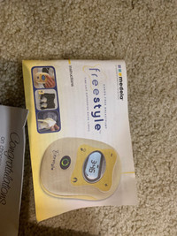 Freestyle Medela double breast pump and bottles and nipples