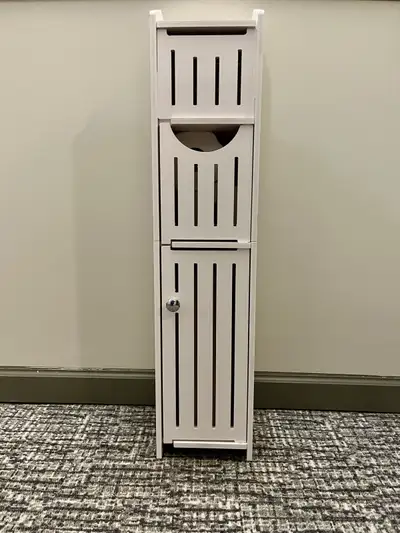 Spruce up your bathroom with this slim white design storage unit which is 30” tall 7” wide and 7” de...