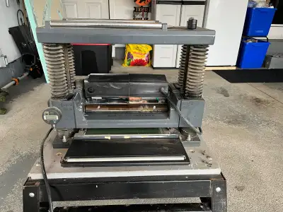 Craftsman 12inch thickness planer with movable cart and vacuum duct. Used for hobby. New blades inst...