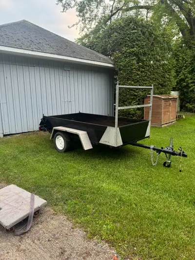 This heavy-duty 9-foot utility trailer has been fully refurbished in 2025 and is in excellent condit...
