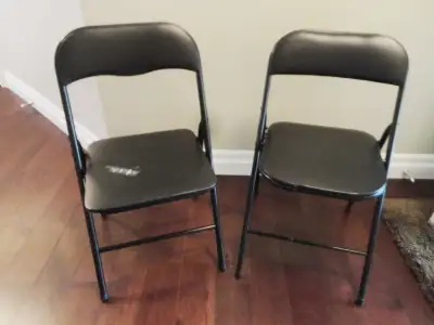 2 Black Vinyl Padded Seat Metal Frame Folding Guest Card Table Chairs. In great shape but one has a...