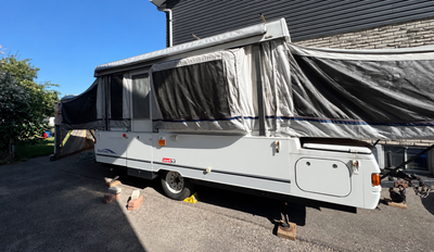 A very roomy pop-up with two king-size bunk ends and a slide-out dinette. The dinette slide is not p...