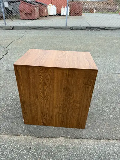 This is a vintage side table with a unique pull-out writing desk feature, perfect as a night stand o...