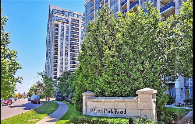 1 1 den condo Bathurst St/Center St March 1/April 1