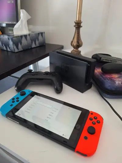 Nintendo Switch with pro controller and accessories, View more