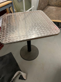 Stainless steel table top w/cast iron base. 2’.3” square 29.5”H