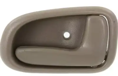All four indoor Toyota Corolla door handles. Brand new. 1998-2002 models