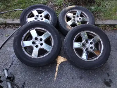 Good condition tires on good alloys Dodge 215-65-16 tires have 6mm and no cracks, i bought these new...