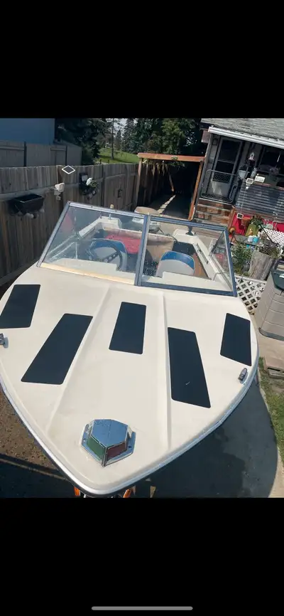 Selling my boat with trailer for health reasons! Great for fishing! Has a 55 hp Evinrude motor! Trai...