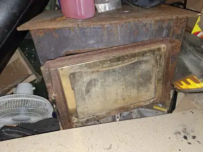 Wood stove for sale, perfect for a cabin, piping included. Located in lac la biche for pickup