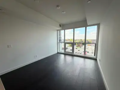This modern studio apartment at 68 Esther Shiner Blvd features high-end finishes, including a sleek...