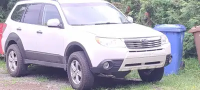 Subaru forester2009 moteur changer vla 2 ans 150 000 kilomètres le système d exaust est a changer pl...