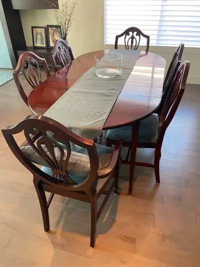 Solid mahogany Gibbard dining table and 8 chairs, View more