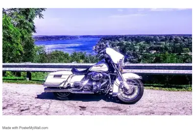 2005 Road King Pearl White in good condition. Good rubber and the battery is a couple years old. 2 i...
