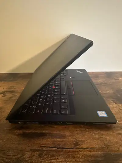 I'm selling a used Lenovo Thinkpad laptop with a 14-inch screen, perfect for professionals or studen...