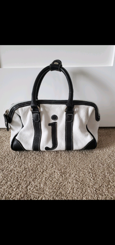 Collectors J Roots leather purse