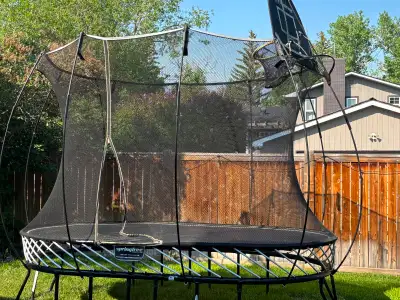 Oval Springfree trampoline. Comes with basketball net and steps. Good condition with 1 minor repair....