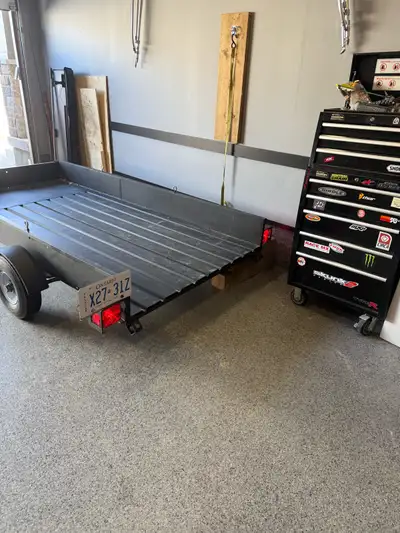 Utility trailer in great condition all steel. New tires/rims, trailer has been fully rewired with ne...