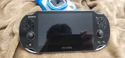 MINT PS Vita Slim (Black) - No Scratches w/ Original Charger, View more