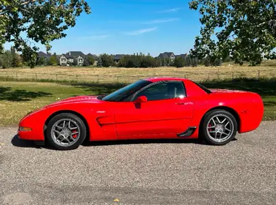 Own a piece of American muscle with this striking Torch Red 2001 Chevrolet Corvette Z06, a sports ca...