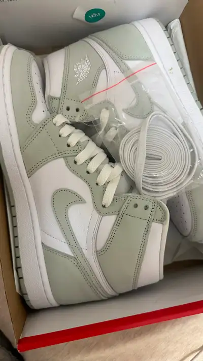 Brand new Jordan 1 High in seafoam green and white. Still in the original box with extra laces. Size...