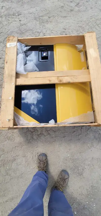 I am offering a new side door for a CAT excavator, still in its original packaging. This yellow door...