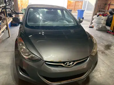 2012 Hyundai Elantra. 224000km. Has some rust on the body. Engine was replaced at 75km at Crowfoot H...