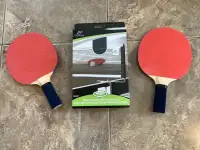 Table tennis net & post set and 2 table tennis paddles $22