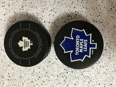 Official Toronto Maple Leafs Game Pucks. These pucks were caught at a Leaf game 3 years ago and 15 y...
