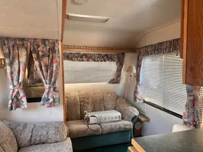 1990 34' Security With Wheel Holiday Trailer Front Living Room They don't build them like this anymo...