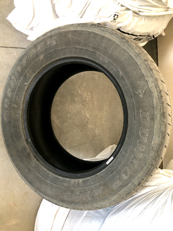 P285/60R18 Dunlop Grandtrwk AT23 tires for sale in Tires & Rims in Calgary
