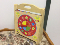 Two sided play and learn clock/blocks