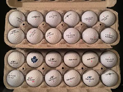  Two dozen Topflite golf balls in mint condition, View more