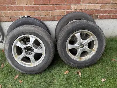 I am selling a set of used Onyx NY-W708 snow tires mounted on rims, size 235/65R17 104T, ready to ta...
