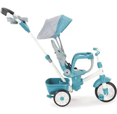 Seldomly used like new. The Perfect Fit 4-in-1 Trike in teal grows with your child! First, the paren...