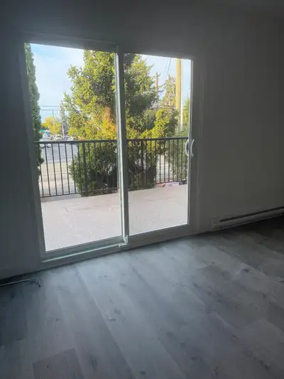 Spacious 4-bedroom 3-bathroom + family room townhouse in a 4-plex building, with new interior and at...