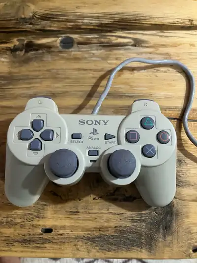 Selling 2 OEM PS1/PS2 controllers as they both work on either console Both are fully functional If i...