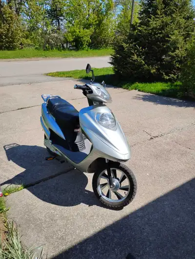 Tao Tao scooter 48 volt plus charger.