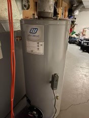 John Wood / beckett oil fired hot water tank in Heating, Cooling & Air in Corner Brook