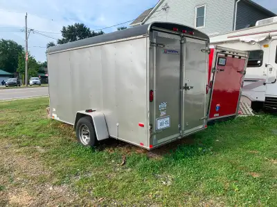 Shelving and a fold down Table . Brand new Tires and a screen Door . I only used it for storage. I w...
