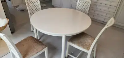 Oval White IKEA 45" x 75" Dining Table with 2 leaves & 8 Chairs, View more