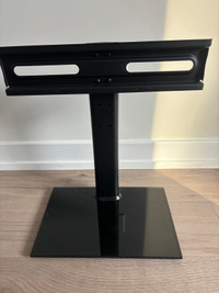 Glass base tv stand up to 5my inches 