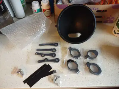 This is a matte black headlight housing or shroud for 7 inch diameter round headlights. The mounting...