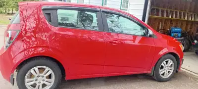 Selling my 2012 chevy sonic for 3,000 has new parts including new wheel bolts and has new radio and...