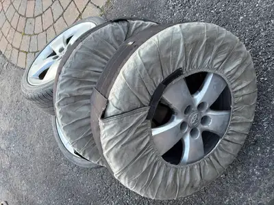 4 all season tires for sale with Toyota Al alloy RIMs. Tiger Paw Touring, used 2 seasons (new $150+t...